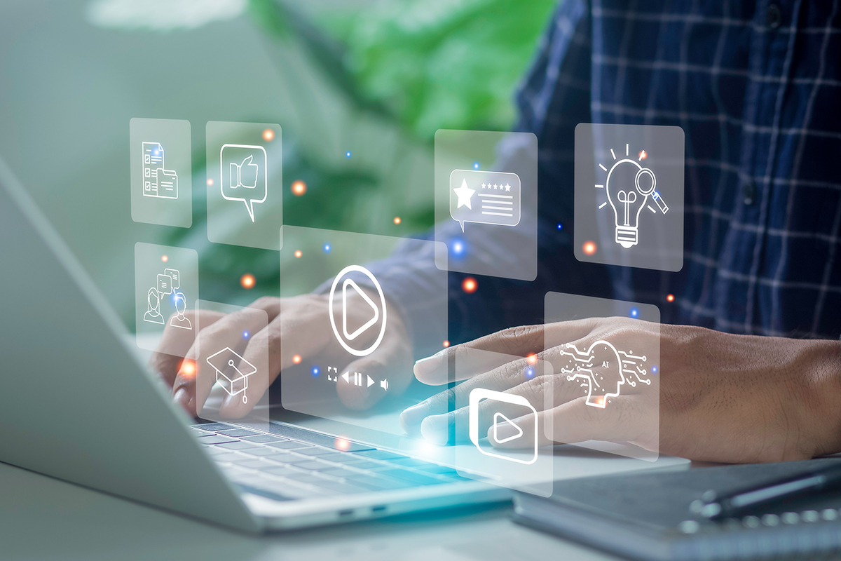 Person using a laptop with marketing and AI concept icons overlaid